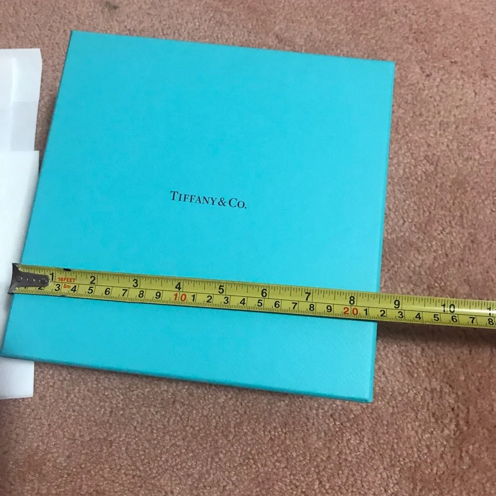 Tiffany box in very good condition plus a small bag of